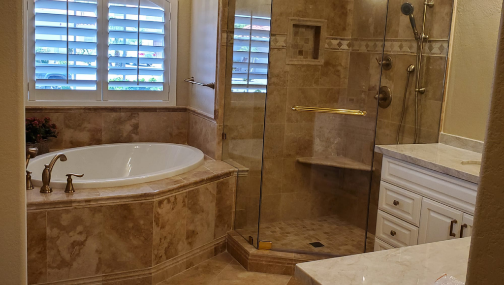 A beautifully completed bathroom remodel featuring a new tub and shower by Southwest Restoration & Design, Inc. in Peoria, AZ.