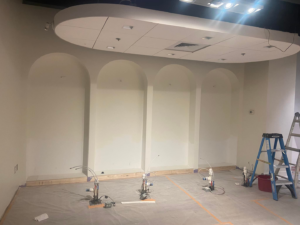 A bathroom remodeling project with arched wall niches, new ceiling, and plumbing rough-ins by DG Pro Remodeling in Charlotte, NC