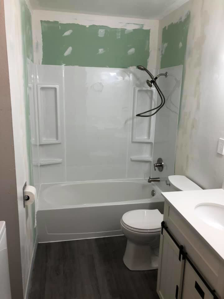 Bathroom renovation in progress with new tub and drywall installation by J & J Cavallo Custom, LLLP in Yakima, WA