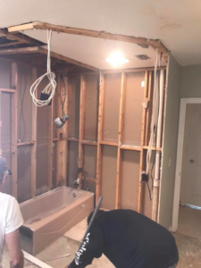 A bathroom renovation project showing framing and electrical work by Daley Construction, LLC in Tampa, FL.