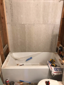 Bathroom renovation in progress with new bathtub and cement board installation by Ken Sweeney Property Solutions in Knoxville, TN