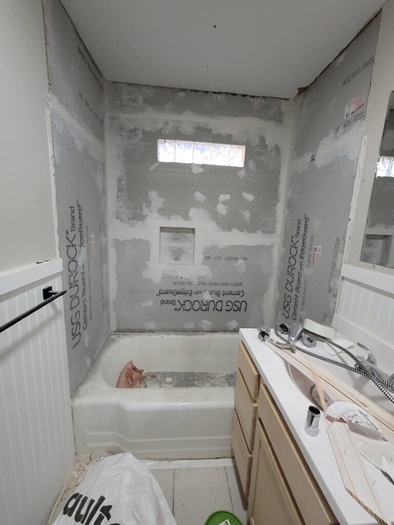Bathroom renovation in progress with cement board installed for tiling by Friendly Handyman LLC in Wichita, KS