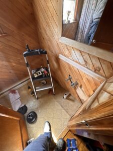 A bathroom renovation in progress with tools and exposed plumbing by Premier Handyman Services in Lexington, KY.