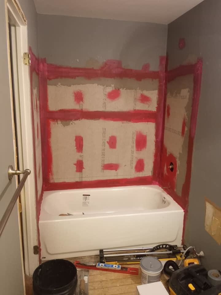 Bathroom renovation showing new bathtub installed and walls prepped for tiling by DG Maintenance Services LLC in Wilmington, DE