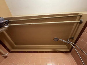 Completed bathroom shower area painting and repair by S & H Painting and Drywall LLC, a handyman in Montgomery, AL.