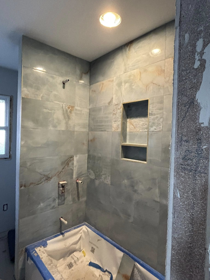 New tile installation in a bathroom shower by Gregg Hoffman Construction Inc. in Tacoma, WA