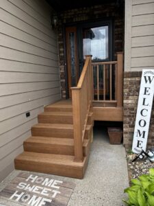 A newly installed dark grey patterned shower and tub surround in a bathroom by ROTH WORX LLC in Bismarck, ND.