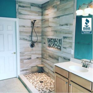 A newly tiled bathroom shower and vanity installed by Stapleford Flooring LLC in Milford, DE.