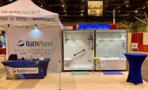 A showroom display featuring a modern shower and bathtub installation by Bath Planet of STL & More in Saint Charles, MO.