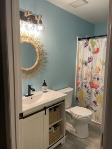 Bathroom vanity, mirror, and light fixture installation by A Man Who Can LLC, your handyman in Milford, DE.