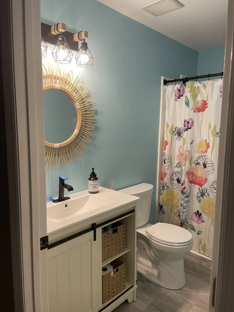 Bathroom vanity, mirror, and light fixture installation by A Man Who Can LLC, your handyman in Milford, DE.