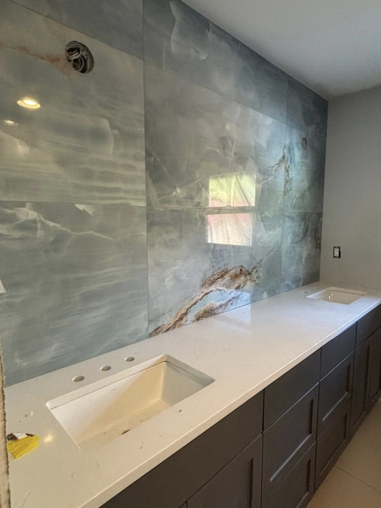 Bathroom vanity area featuring new tile work by Gregg Hoffman Construction Inc. in Tacoma, WA
