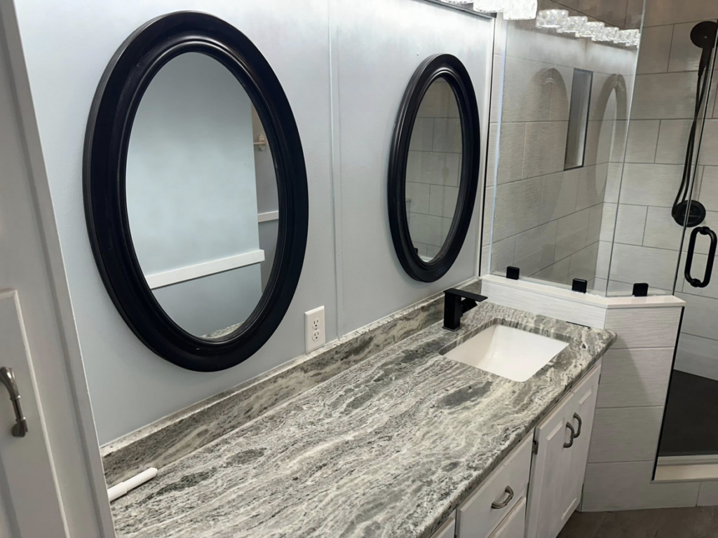 New bathroom vanity, sink, and mirror installation by W. Brian Roberts Construction in Wilmington, NC
