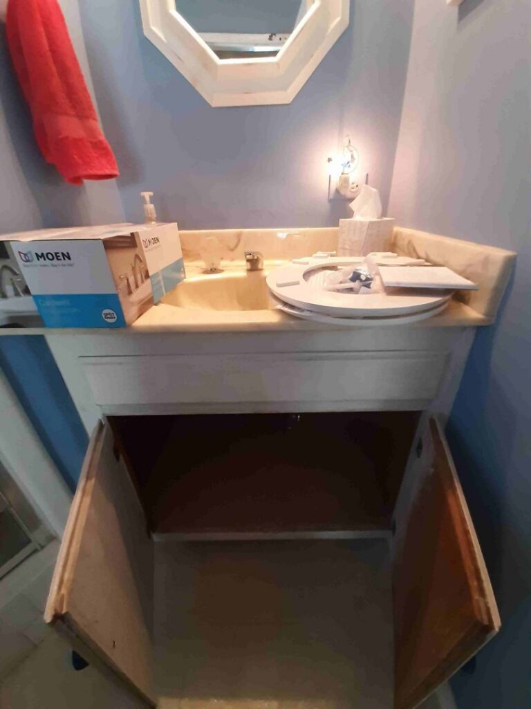 A bathroom vanity replacement in progress with new faucet box by Victor White Handyman in Long Beach, CA