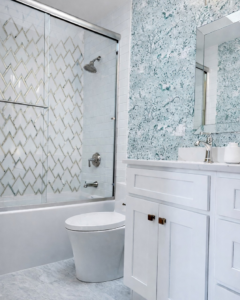 A newly installed bathroom vanity and shower by Alpine Contracting in Colorado Springs, CO