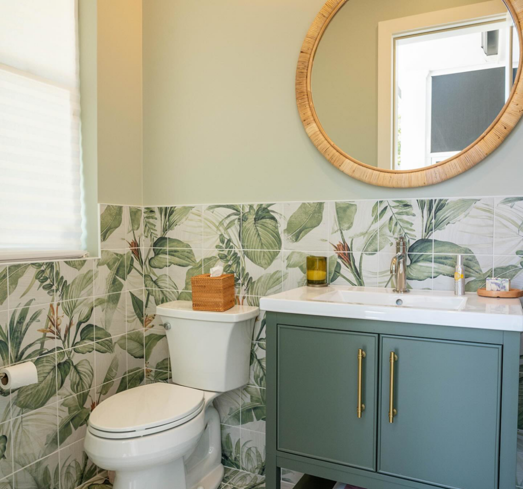 A newly installed bathroom vanity, toilet, and mirror by FITZ Construction, your trusted handyman in Kenner, LA.