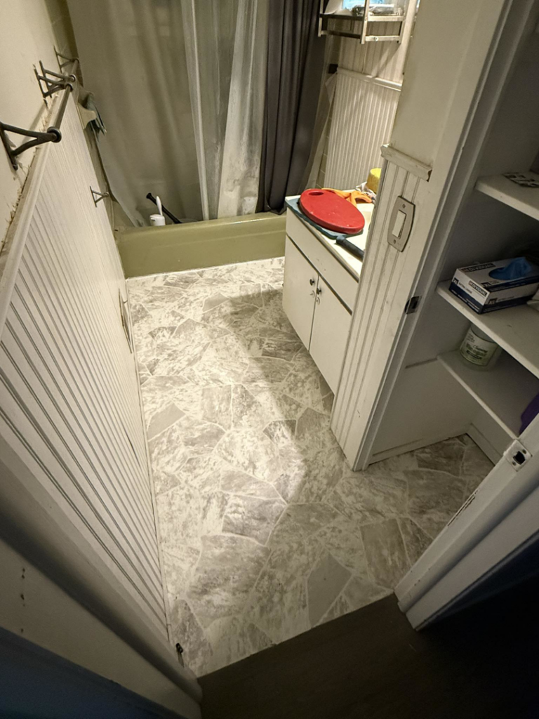 Newly installed vinyl flooring in a bathroom by Johnson's Flooring Solutions LLC in Rochester, MN