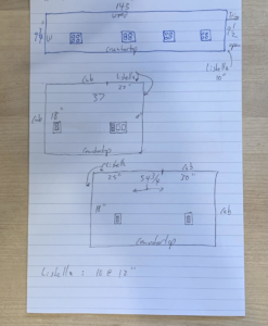 A bathroom wall undergoing demolition or repair, showing exposed studs and debris, handled by Rock Solid Handyman Services in Sparks, NV.