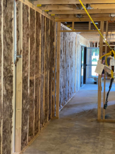 Batt insulation installed between wall studs in a new construction project by Miami Valley Insulation Co LLC in Dayton, OH.