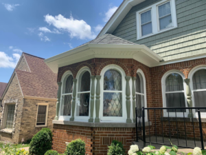 Detailed view of bay window siding and exterior renovation by Sockett Siding, LLC in Milwaukee, WI