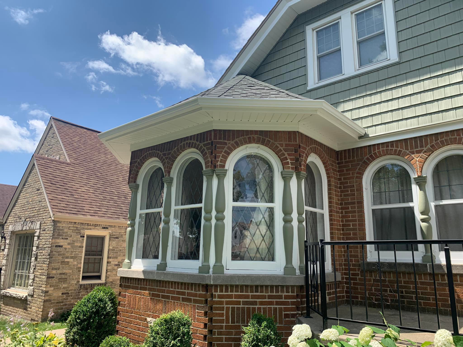 Detailed view of bay window siding and exterior renovation by Sockett Siding, LLC in Milwaukee, WI