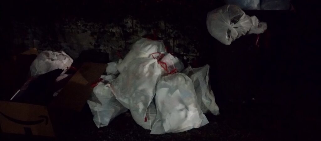 Close-up of "Beckley Garbage Disposal" branding and contact details on a Whitecap Waste truck in Beckley, WV.