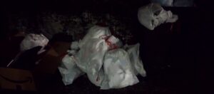 Close-up of "Beckley Garbage Disposal" branding and contact details on a Whitecap Waste truck in Beckley, WV.
