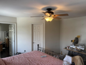 A bedroom renovation in progress with tools visible, managed by MLJ Construction and Design in Pittsburgh, PA