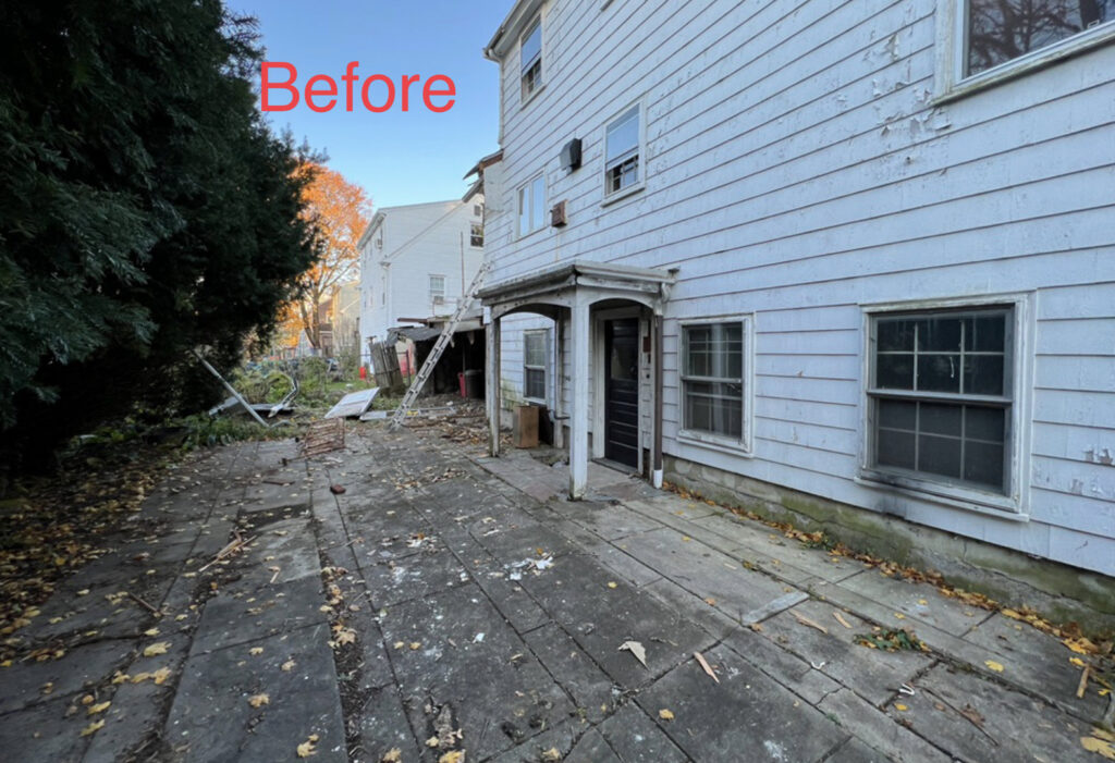 A messy backyard before a junk removal project in Lynn, MA by Altri Junk Removal Services.