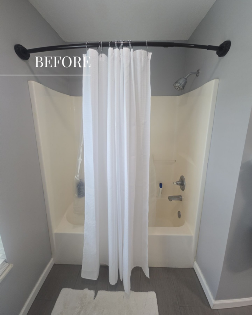 A "before" photo of an old tub and shower combo, ready for a remodel by Modern Bath, LLC in Knoxville, TN.