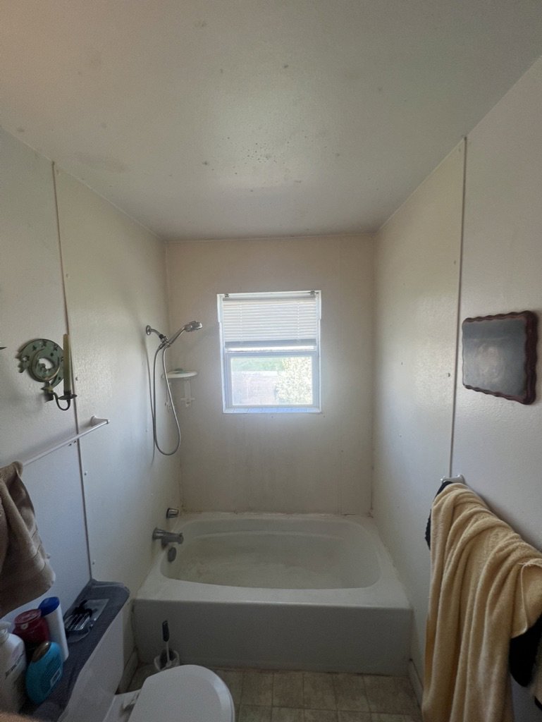 Before photo of a bathroom, ready for a renovation project by High Plains Craftsmen in Cheyenne, WY.
