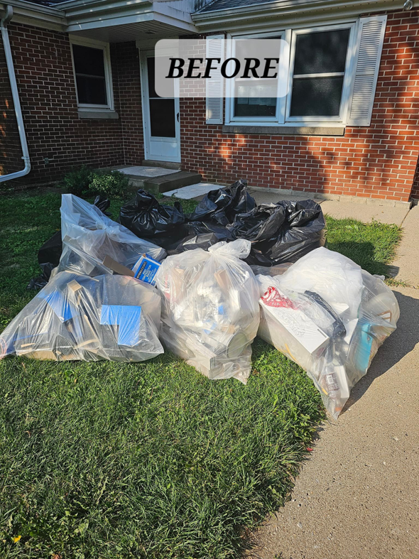 Large bags of household junk piled on a lawn before removal by Mike And Nick's Removal Service in Milwaukee, WI