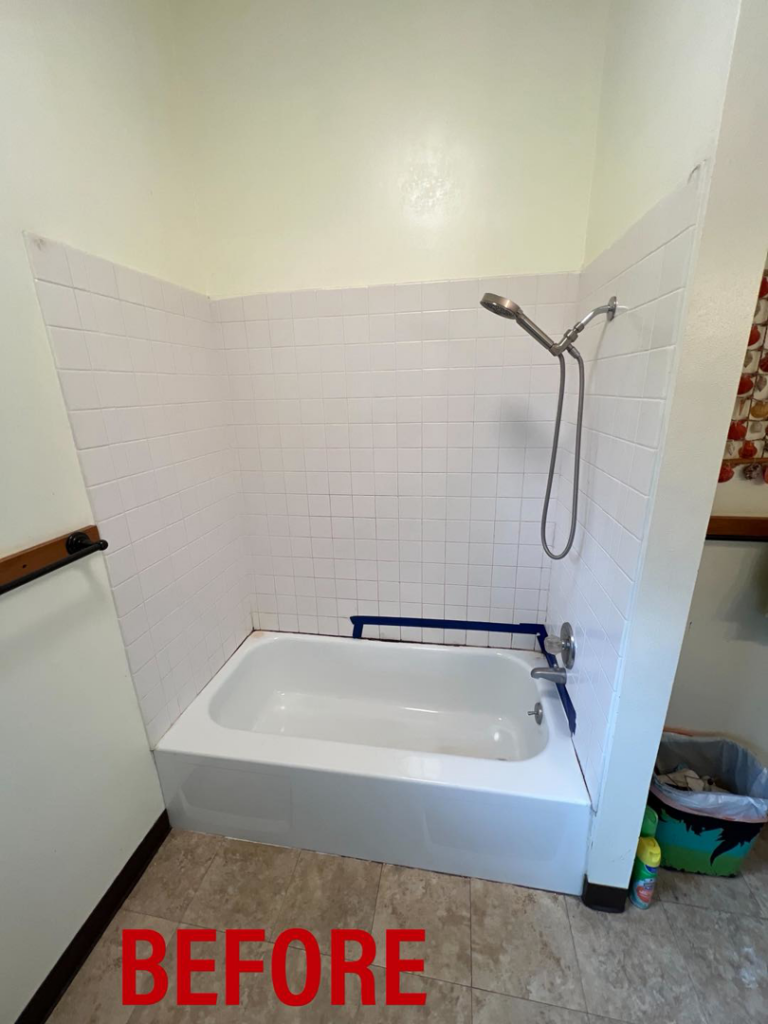 Before photo of an old tiled shower and bathtub, ready for renovation by JKM Services in Solon, OH.