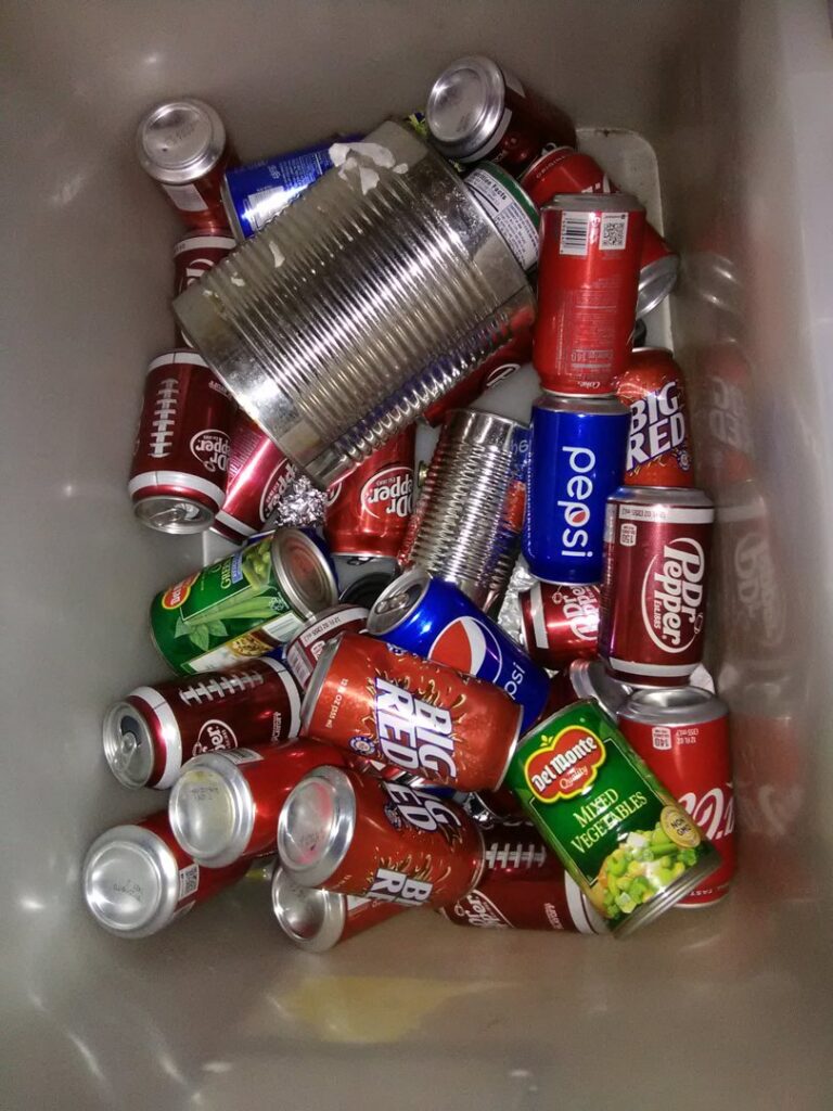 A bin filled with aluminum and tin cans ready for recycling at Great Northwest Recycling in San Antonio, TX