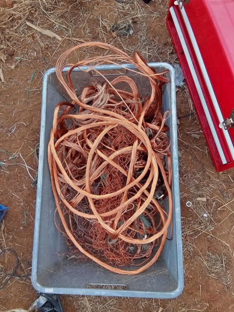 A bin filled with tangled copper wire scrap ready for recycling at Great Northwest Recycling in San Antonio, TX