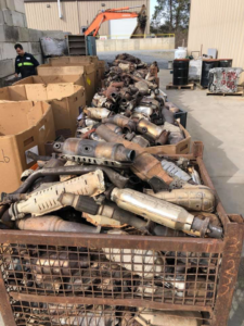 Large bins filled with catalytic converters at the Metal Recycling Inc facility in Johnson City, TN