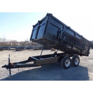 A black dump trailer with its bed raised, used for junk hauling and debris removal by Mr. Property Service in Sanford, ME.