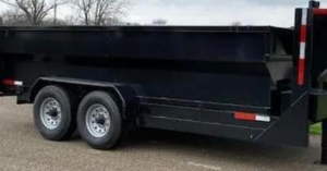 A black dump trailer used for junk removal services by Royal Environmental Services in Tucson, AZ.