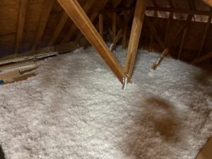 An attic space completely filled with fresh blown-in insulation by Koala Insulation of Charlotte, NC
