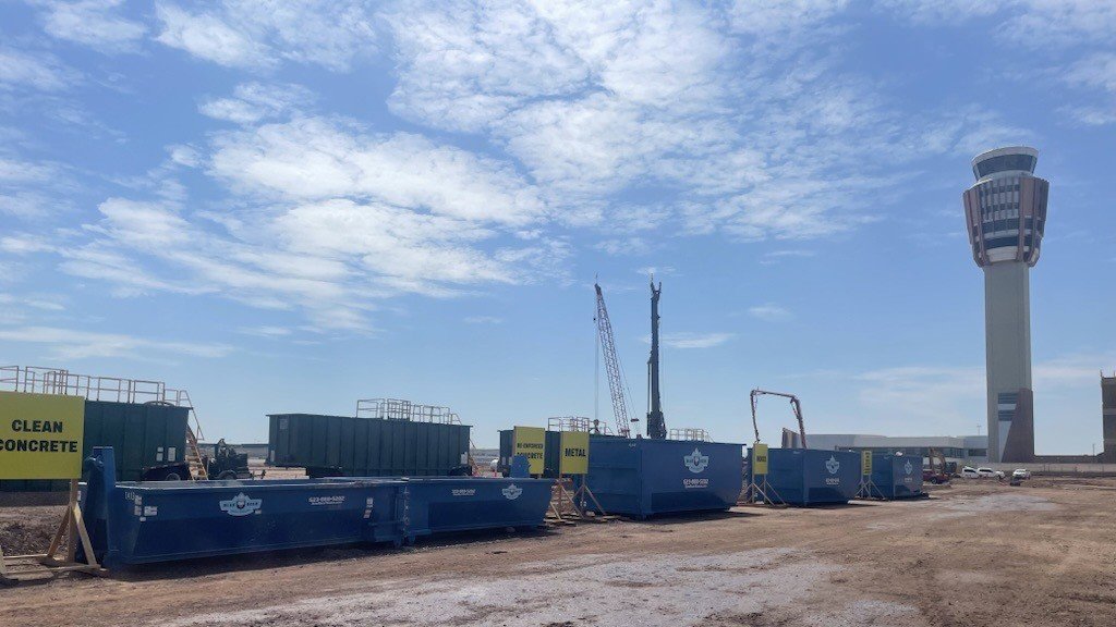 Blue Bear Waste Services dumpsters on a large industrial construction site for waste removal in Denver, CO.