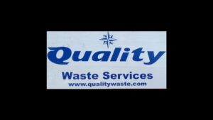 A blue roll-off truck used for junk removal by Quality Waste Service, Inc. in Los Angeles, CA.