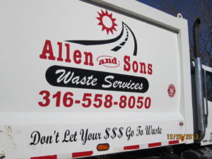The side of a white waste collection truck with Allen and Sons Waste Services branding and slogan in Wichita, KS.