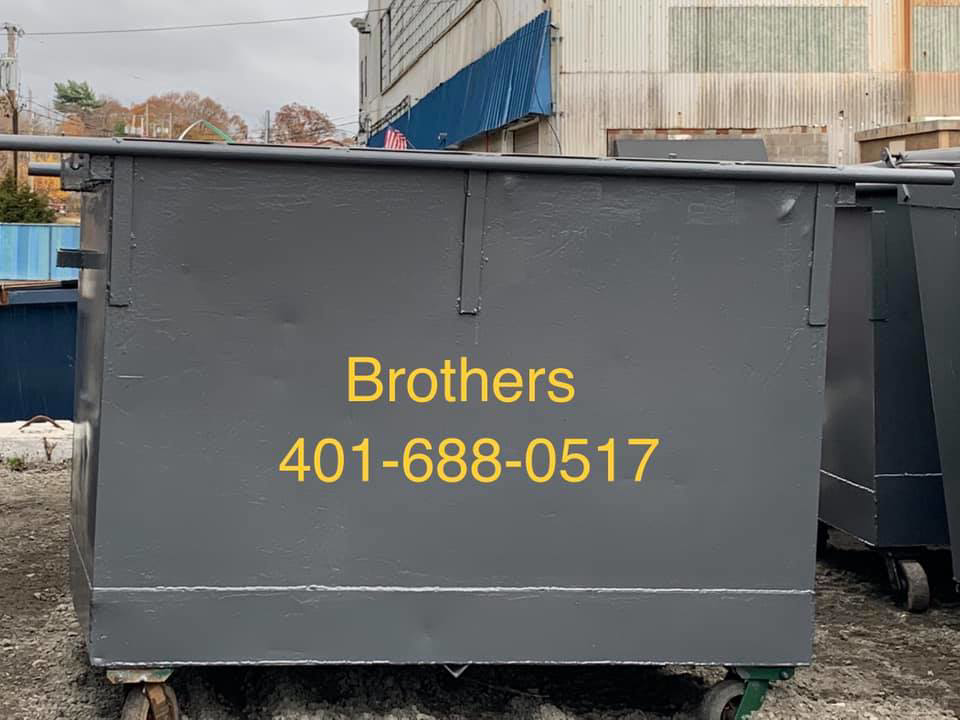 A grey roll-off dumpster from Brothers Disposal, LLC, available for junk removal in Cumberland, RI.