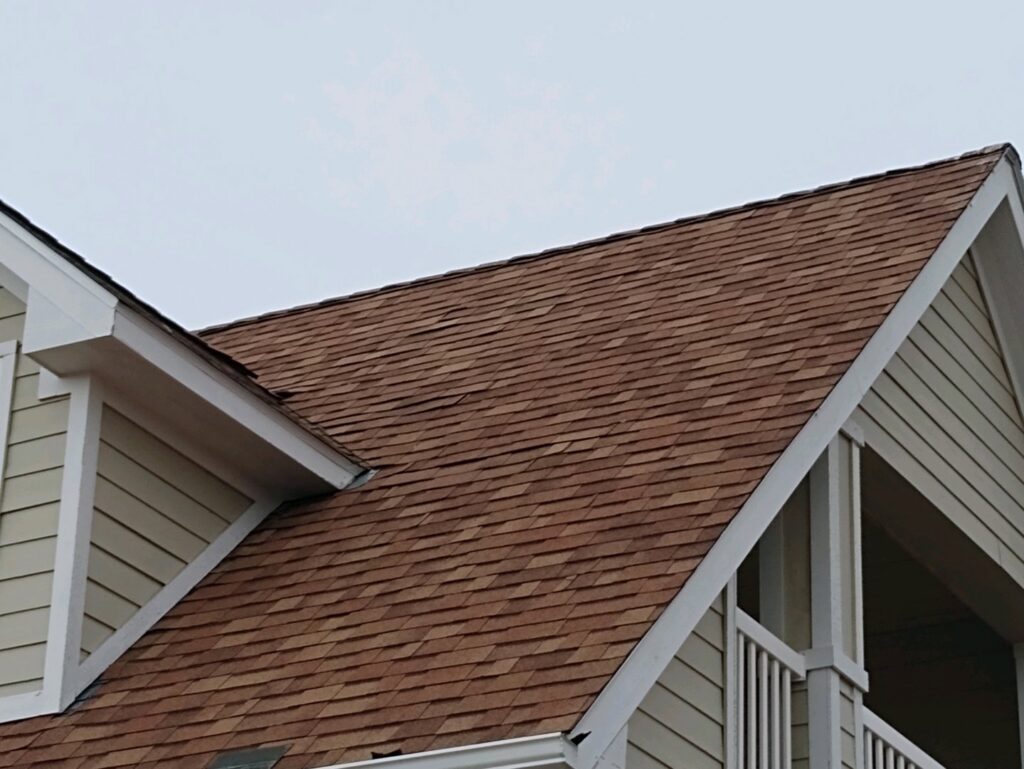 Brown asphalt shingle roof installation on a house by RC Contracting in Chesterfield, MO.