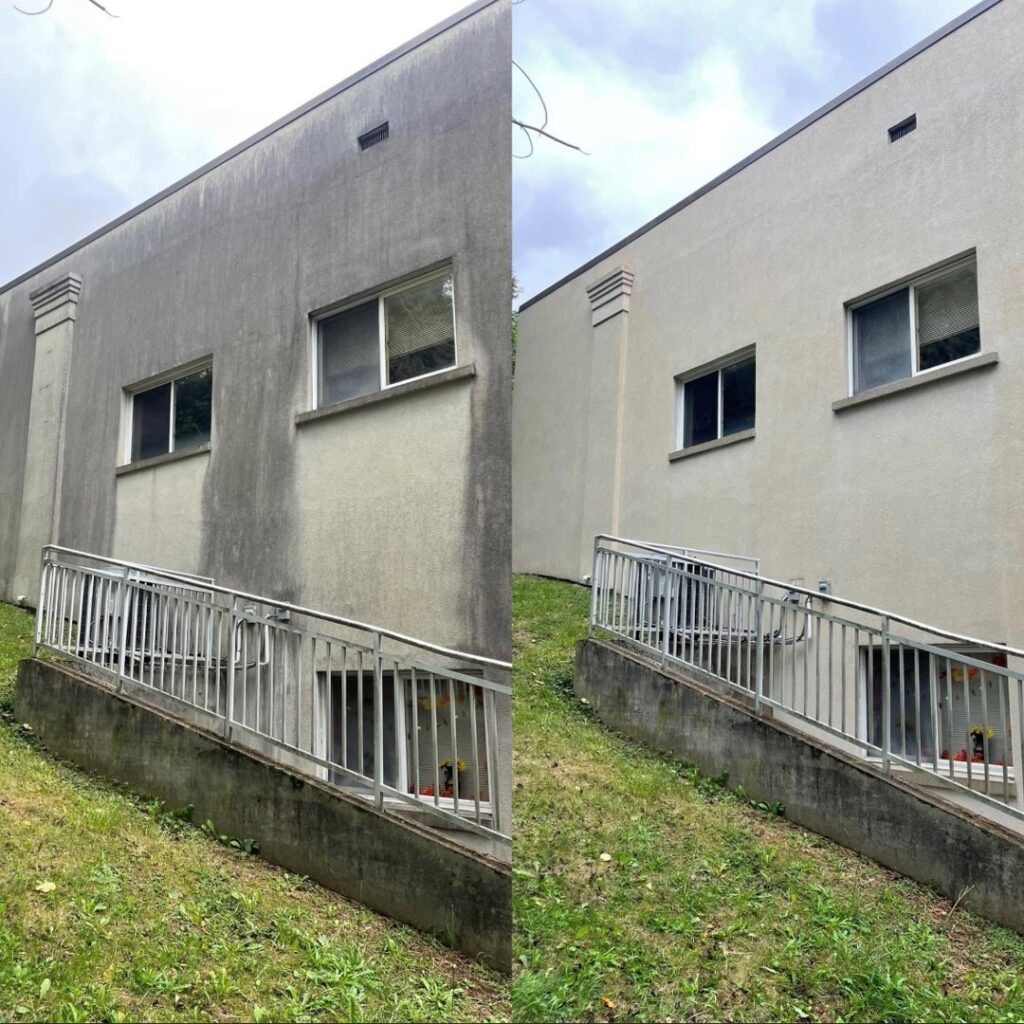 Before and after view of a building wall after professional pressure washing by On Time Performance in Richmond, VA.