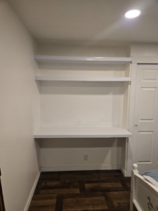 Custom built-in shelves and a desk area installed by Hands On Repair in Renton, WA.