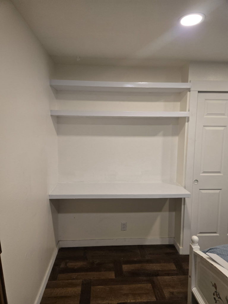 Custom built-in shelves and a desk area installed by Hands On Repair in Renton, WA.