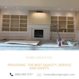 Custom built-in shelves and fireplace renovation in progress, enhancing a living space by SCIRE GROUP INC in Charlotte, NC.