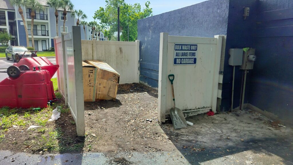 Bulk waste including large cardboard boxes at a designated collection area for Westish Junk Removal LLC in Orlando, FL.