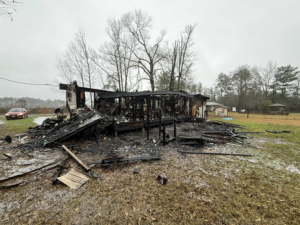 Demolition and debris removal of a burned mobile home by Junk Removal Veterans LLC in Deridder, LA.